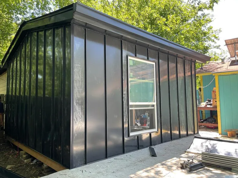 Black standing seam metal wall panels for Roof Inspection in Elsmere